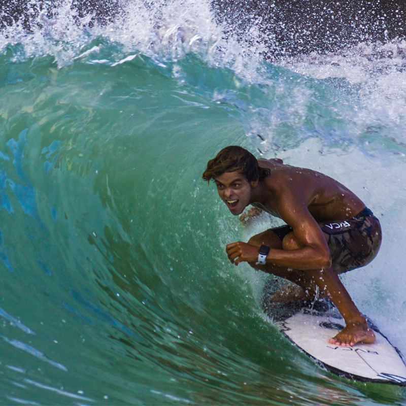Noah Beschen getting barreled in an advanced surf session at Revel Surf Park.